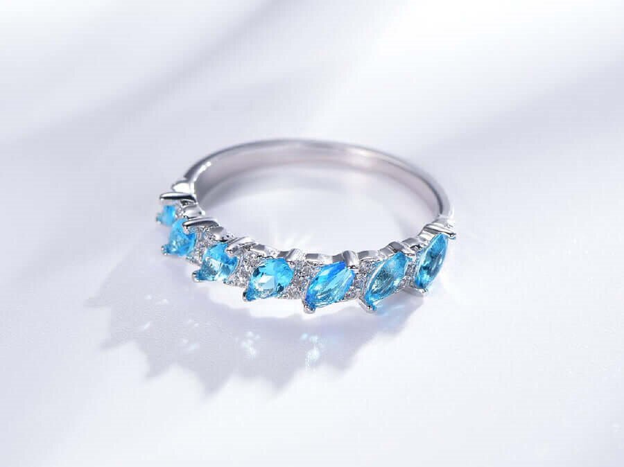 How Sterling Silver Band Rings with Blue Became a Symbol of Modern Romance